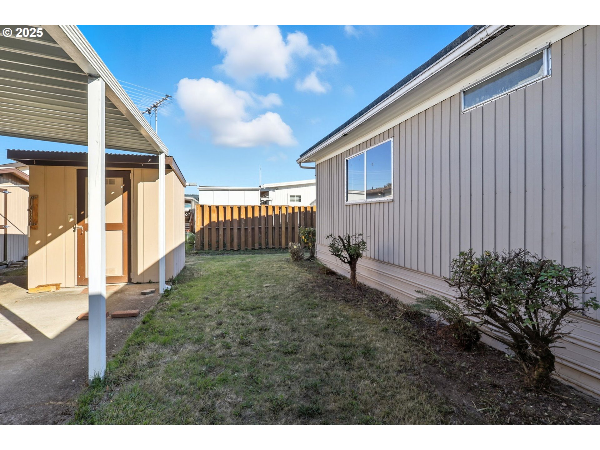 2902 East 2nd Street, Unit 67 Newberg, OR 97132 - Photo 26 of 38 a view of a backyard