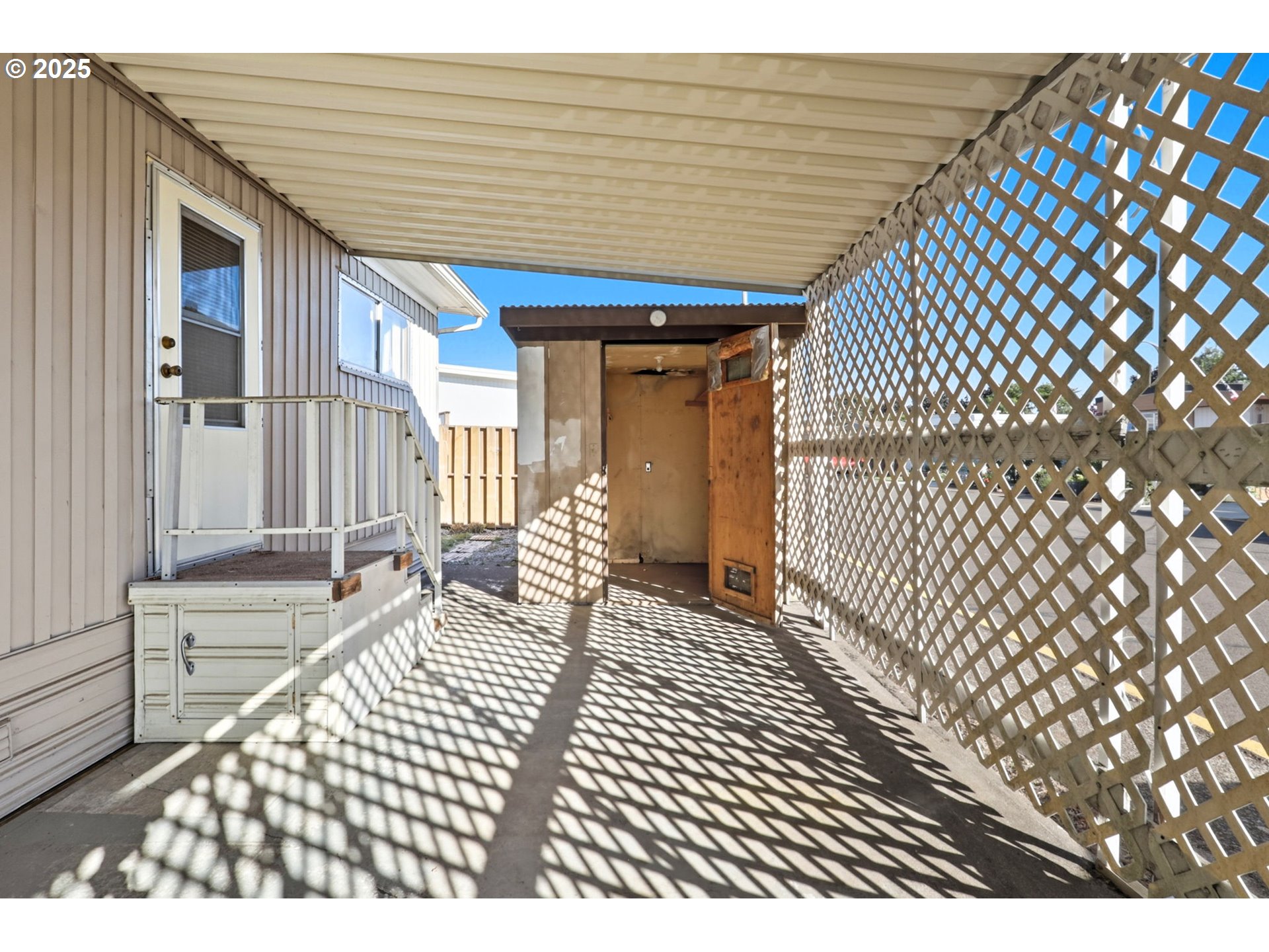 2902 East 2nd Street, Unit 67 Newberg, OR 97132 - Photo 29 of 38 a balcony view with a glass door