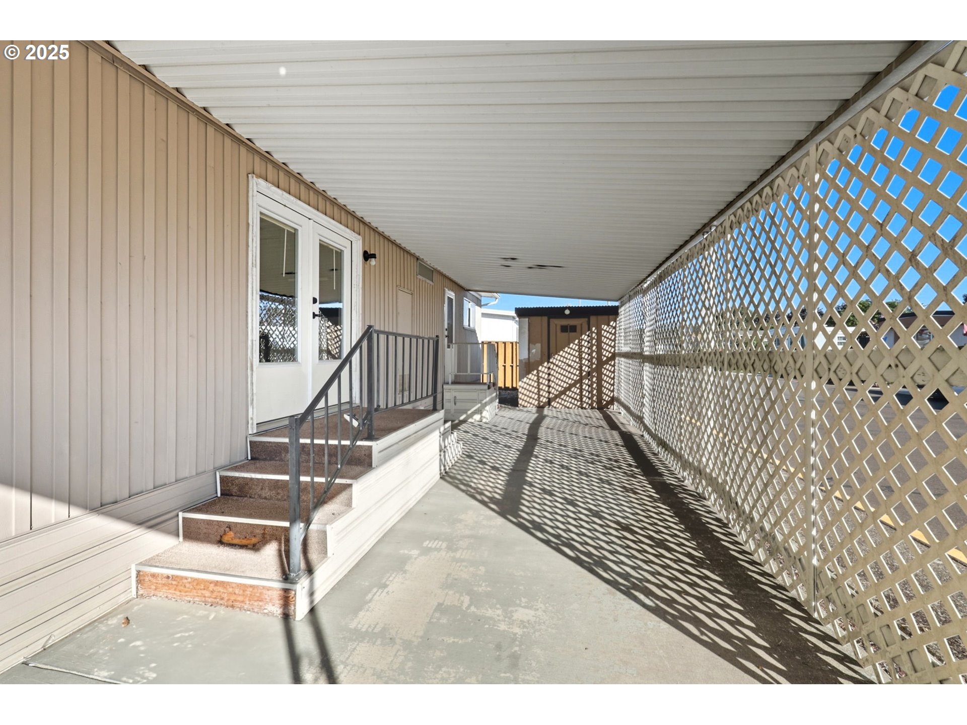 2902 East 2nd Street, Unit 67 Newberg, OR 97132 - Photo 30 of 38 a view of entryway with wooden floor