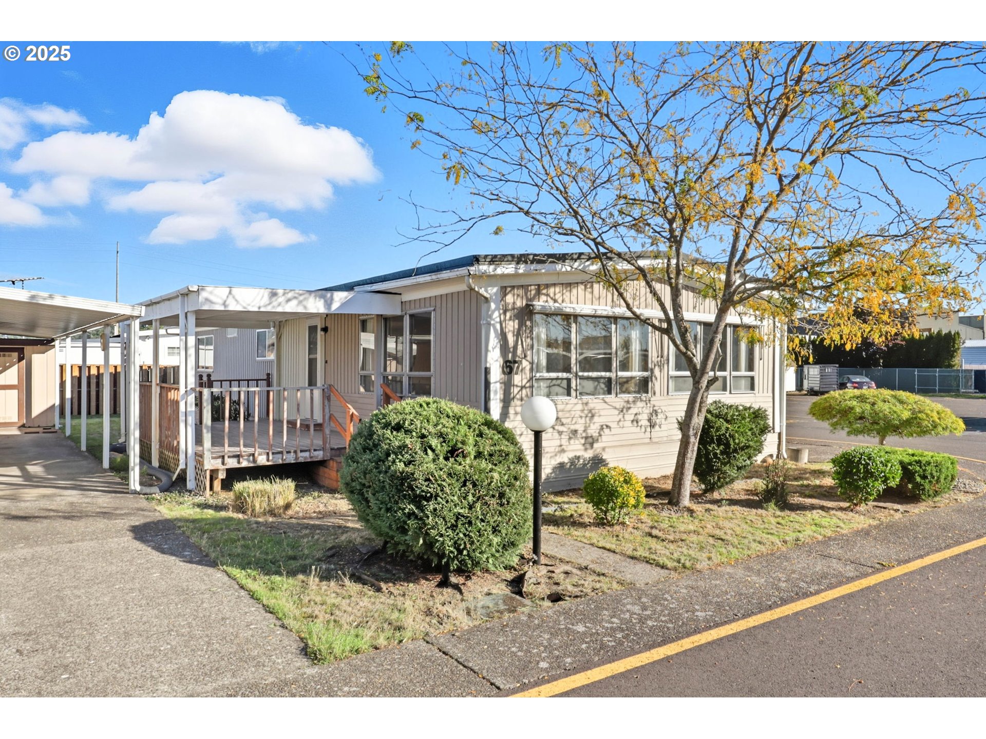 2902 East 2nd Street, Unit 67 Newberg, OR 97132 - Photo 31 of 38 a view of a front of a house with a yard