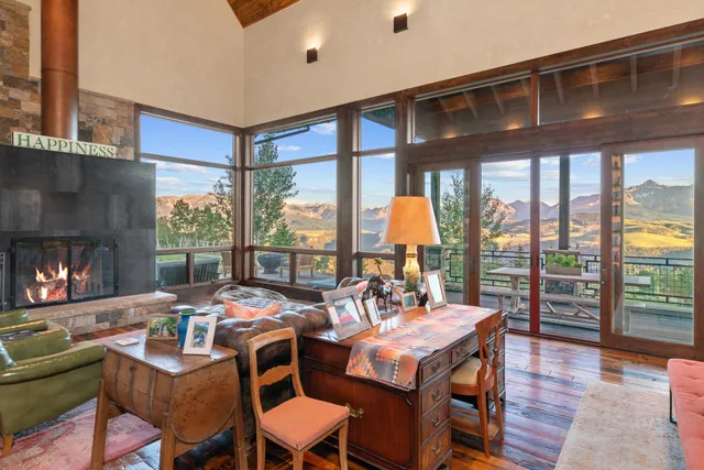a kitchen with a table and chairs in it