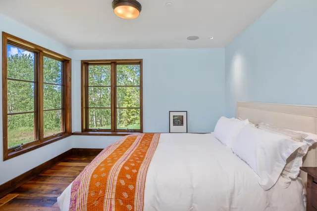 a view of an ocean and a mountain