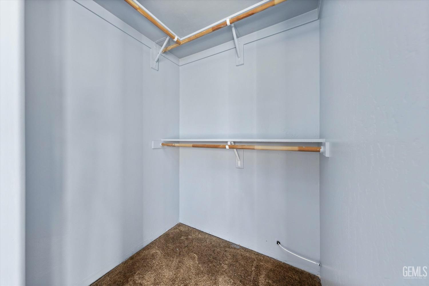 Undisclosed Address Shafter, CA 93263 - Photo 20 of 30 a view of a room with shelf