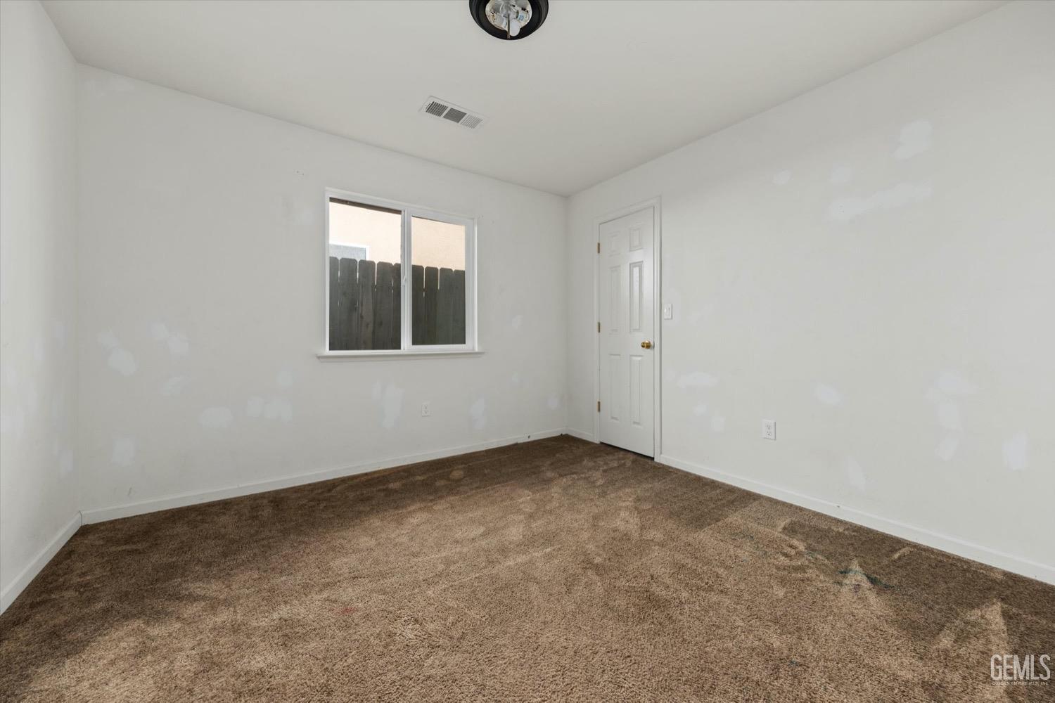 Undisclosed Address Shafter, CA 93263 - Photo 21 of 30 an empty room with windows