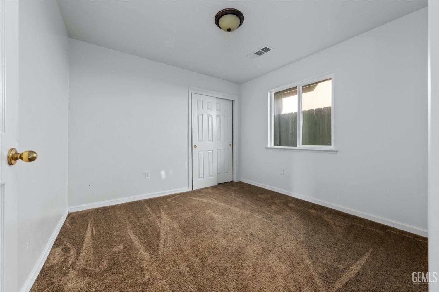 Undisclosed Address Shafter, CA 93263 - Photo 25 of 30 an empty room with windows