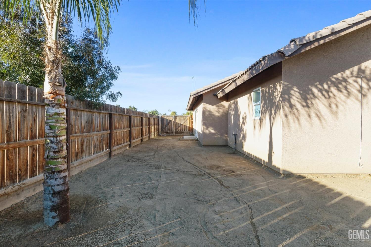 Undisclosed Address Shafter, CA 93263 - Photo 28 of 30 a view of backyard and tree