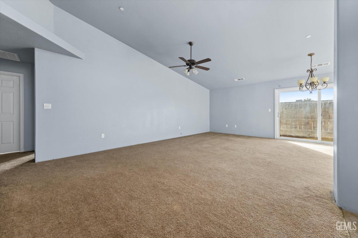 Undisclosed Address Shafter, CA 93263 - Photo 6 of 30 a view of an empty room with a window