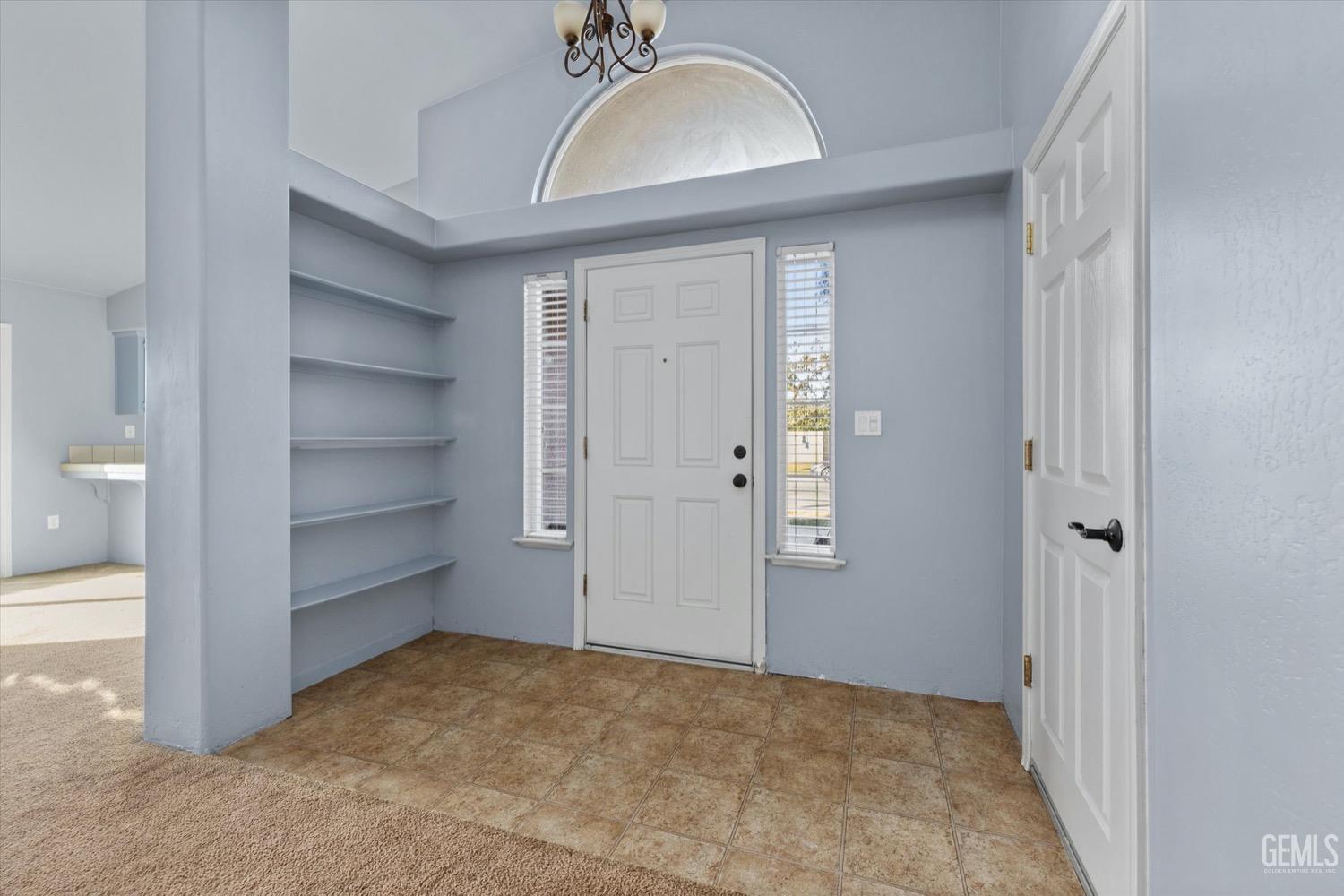 Undisclosed Address Shafter, CA 93263 - Photo 7 of 30 a view of an empty room and a bathroom