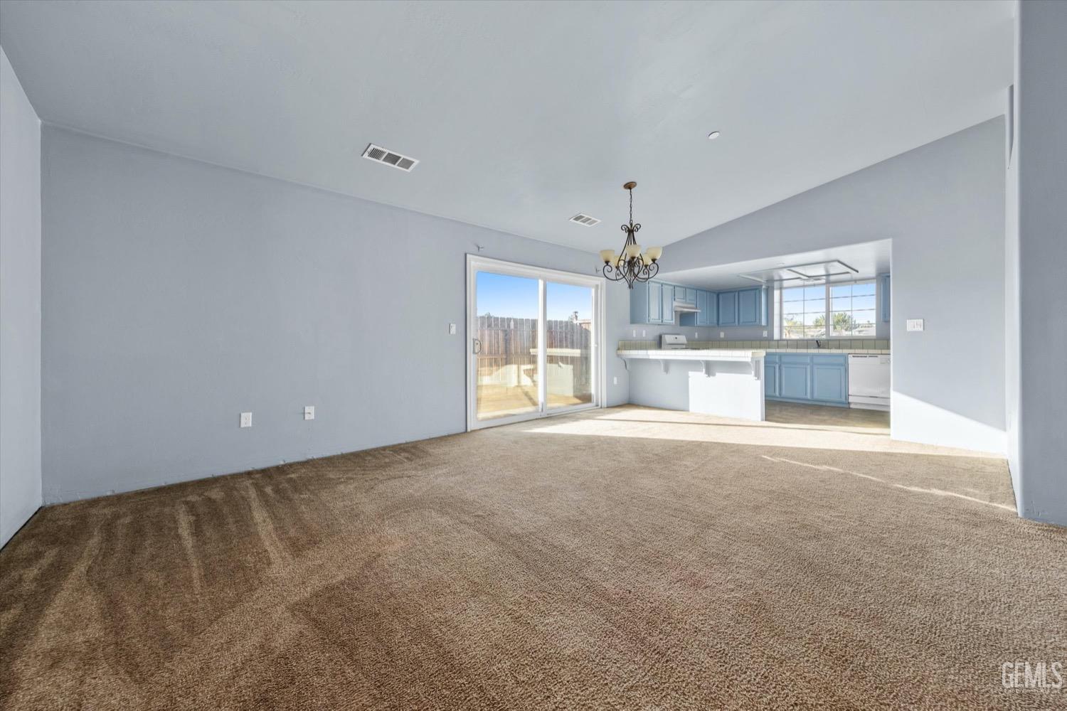 Undisclosed Address Shafter, CA 93263 - Photo 9 of 30 a view of empty room with a kitchen