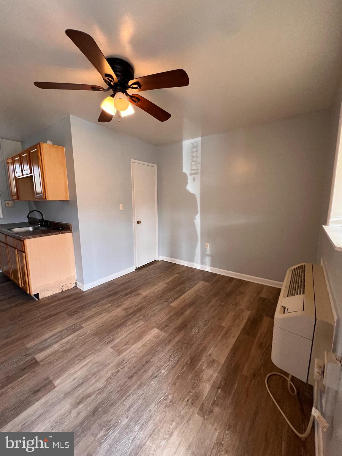 349 Halltown Road, Unit 8 Harpers Ferry, WV 25425 - Photo 3 of 7 a view of a workspace with wooden floor