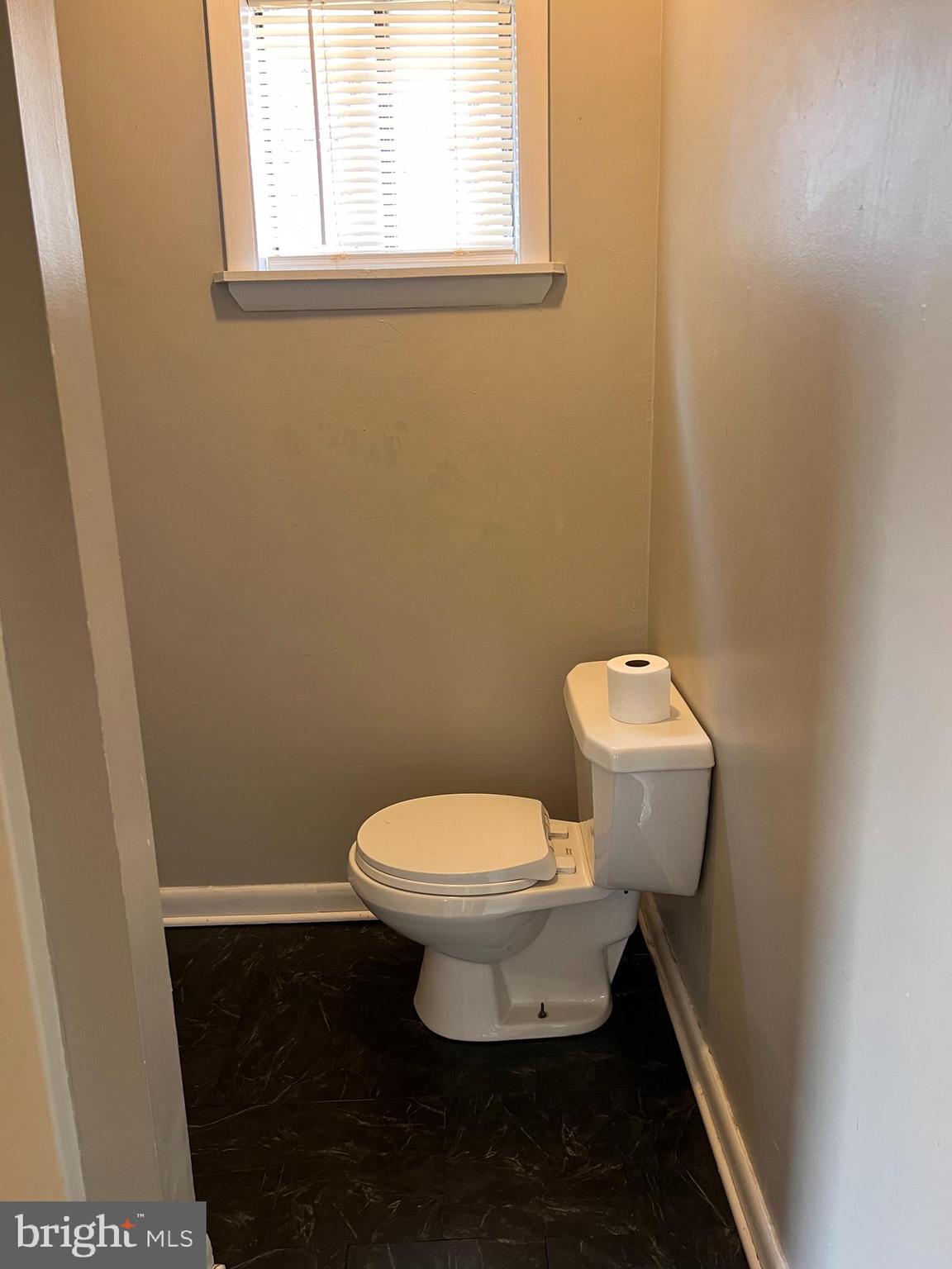349 Halltown Road, Unit 8 Harpers Ferry, WV 25425 - Photo 5 of 7 a bathroom with a toilet and a window