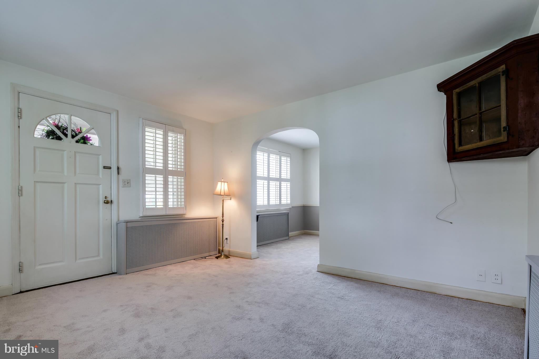 706 Dorchester Road Baltimore, MD 21229 - Photo 22 of 25 Front door from stair landing