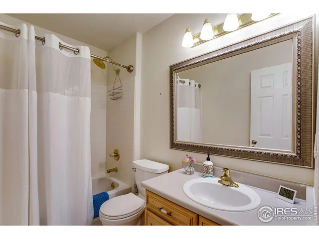 a workspace with furniture and a window