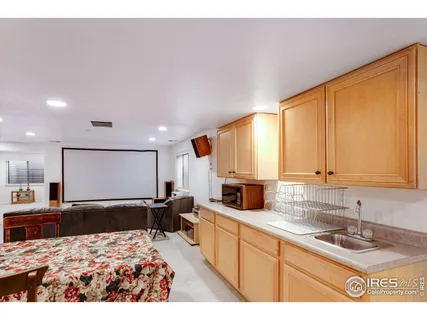 a bed room with a bed and furniture