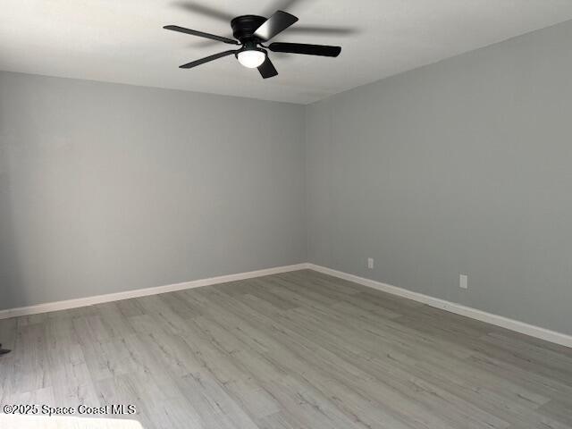 4517 Kaileen Circle Northeast Palm Bay, FL 32905 - Photo 20 of 34 wooden floor in an empty room