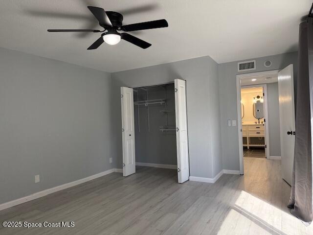 4517 Kaileen Circle Northeast Palm Bay, FL 32905 - Photo 22 of 34 wooden floor in an empty room