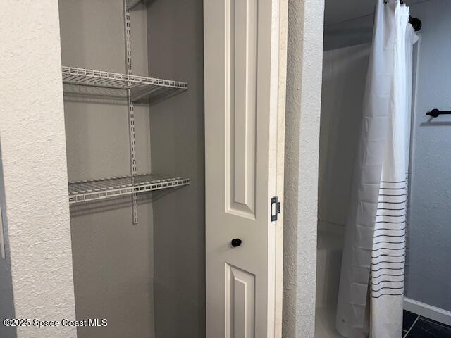 4517 Kaileen Circle Northeast Palm Bay, FL 32905 - Photo 29 of 34 a view of a room with wooden floor