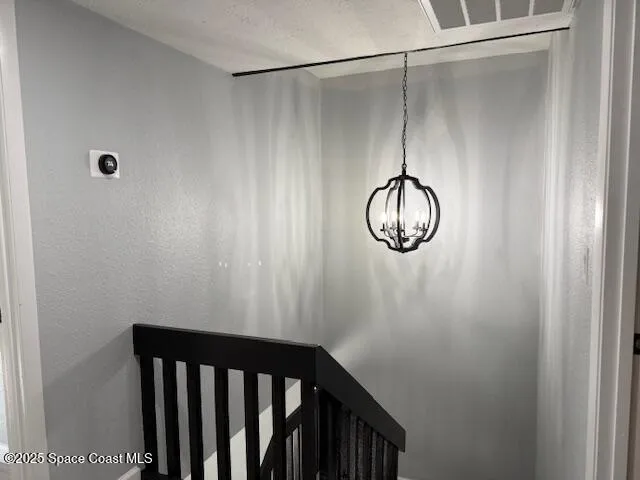 a bathroom with a shower and a mirror