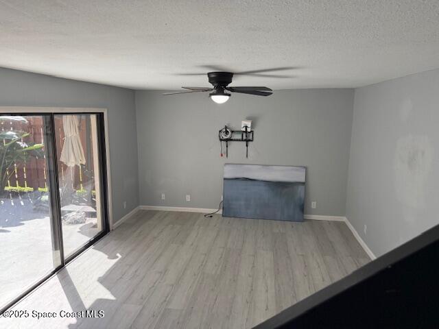 4517 Kaileen Circle Northeast Palm Bay, FL 32905 - Photo 32 of 34 a view of a livingroom with a ceiling fan and window