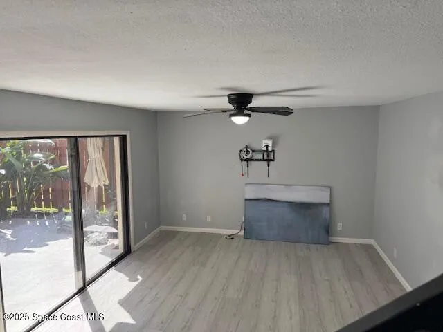 an empty room with windows and view