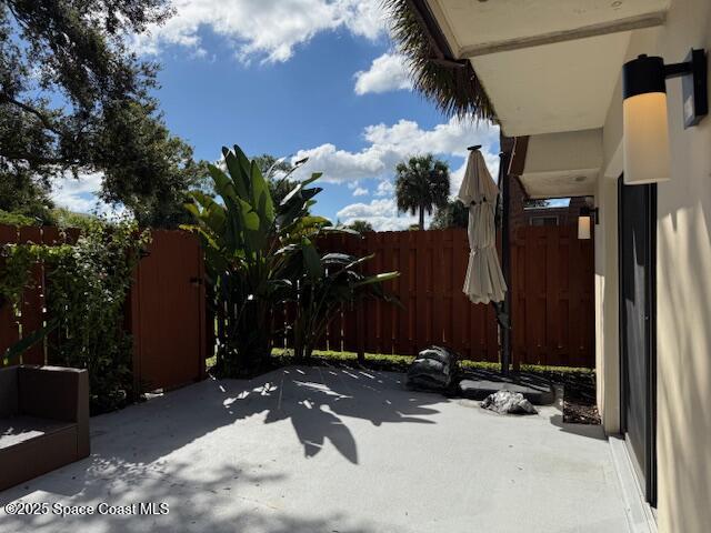 4517 Kaileen Circle Northeast Palm Bay, FL 32905 - Photo 6 of 34 a view of a house with a yard