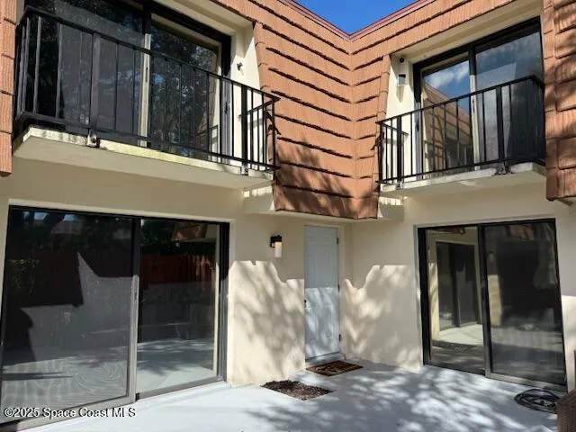 a front view of a house with parking