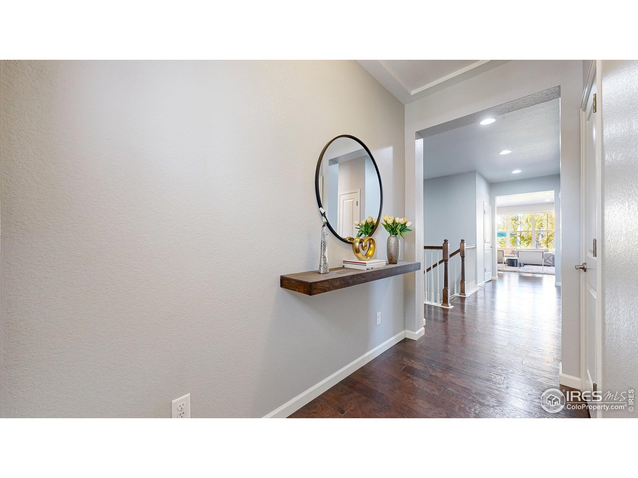 6794 Spring Rain Road Timnath, CO 80547 - Photo 13 of 49 a picture of a living room and a sink