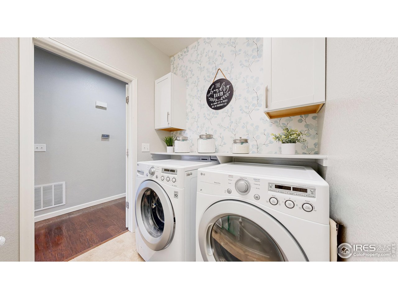 6794 Spring Rain Road Timnath, CO 80547 - Photo 26 of 49 a utility room with dryer and washer