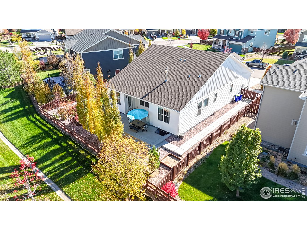 6794 Spring Rain Road Timnath, CO 80547 - Photo 45 of 49 a aerial view of a house with a swimming pool
