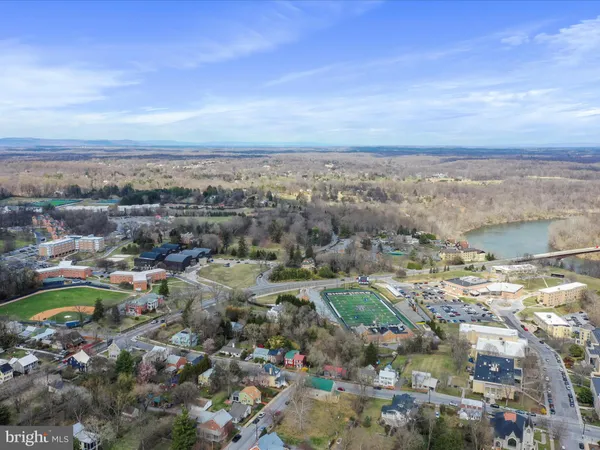 a view of a city with mountains in the background