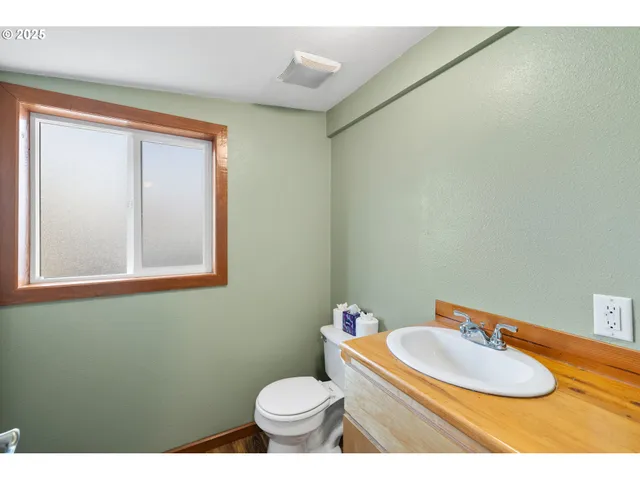 a bathroom with a sink and a toilet