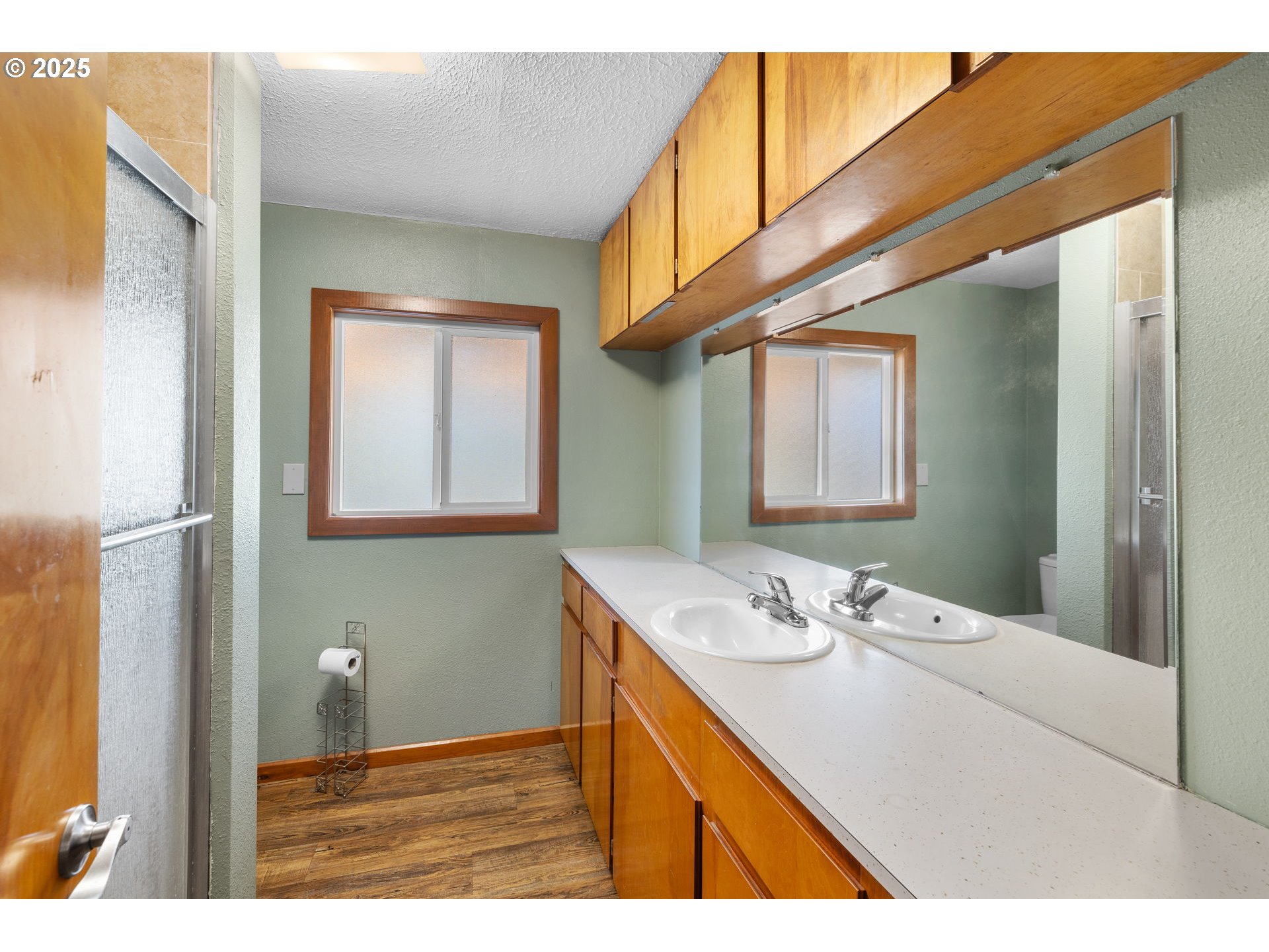14001 South Union Mills Road Mulino, OR 97042 - Photo 18 of 48 a bathroom with a sink vanity and a mirror