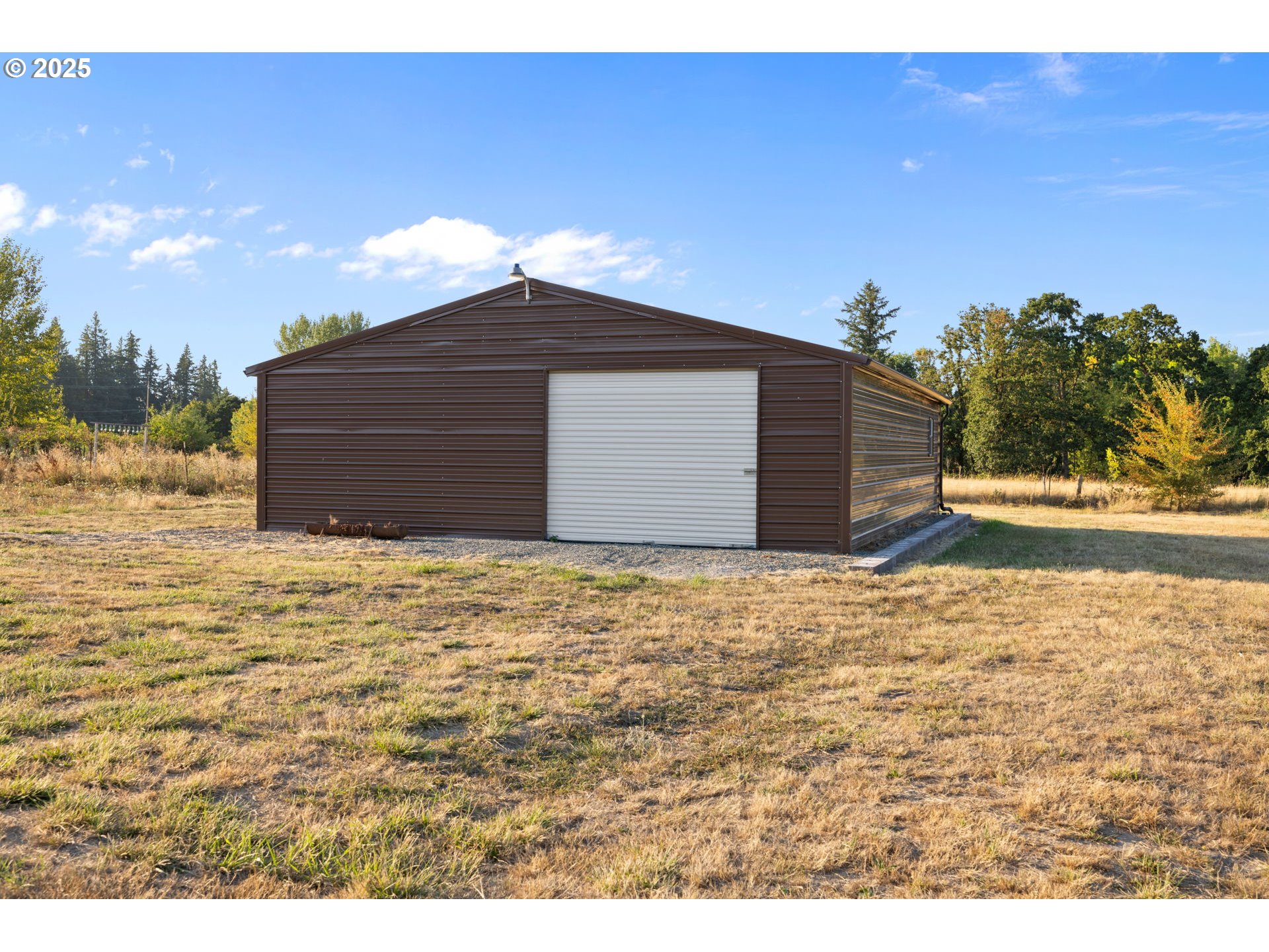 14001 South Union Mills Road Mulino, OR 97042 - Photo 20 of 48 a view of a backyard of the house