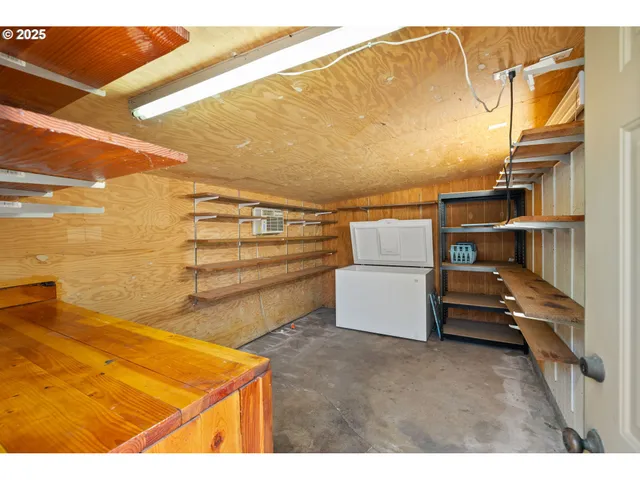 a view of a room with racks on the wall