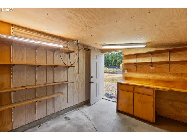 a kitchen with a refrigerator and window