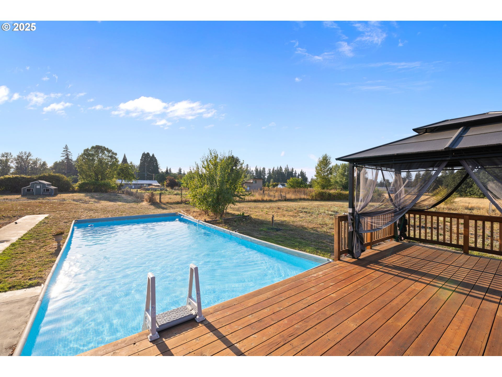 14001 South Union Mills Road Mulino, OR 97042 - Photo 36 of 48 a view of swimming pool with lounge chair