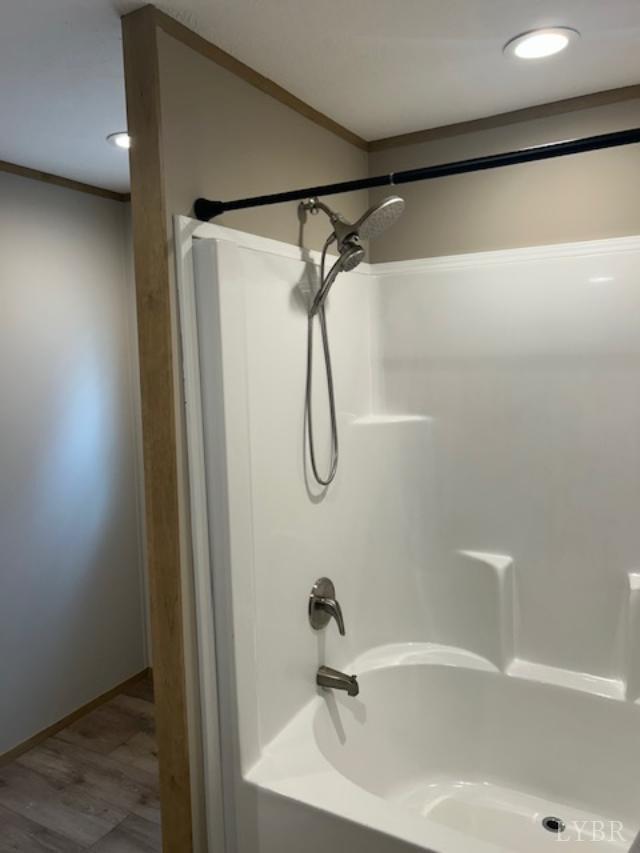 209 Lee Ford Camp Road Ridgeway, VA 24148 - Photo 12 of 19 a bathroom with a shower and a sink