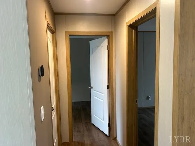 a view of a bathroom from a hallway