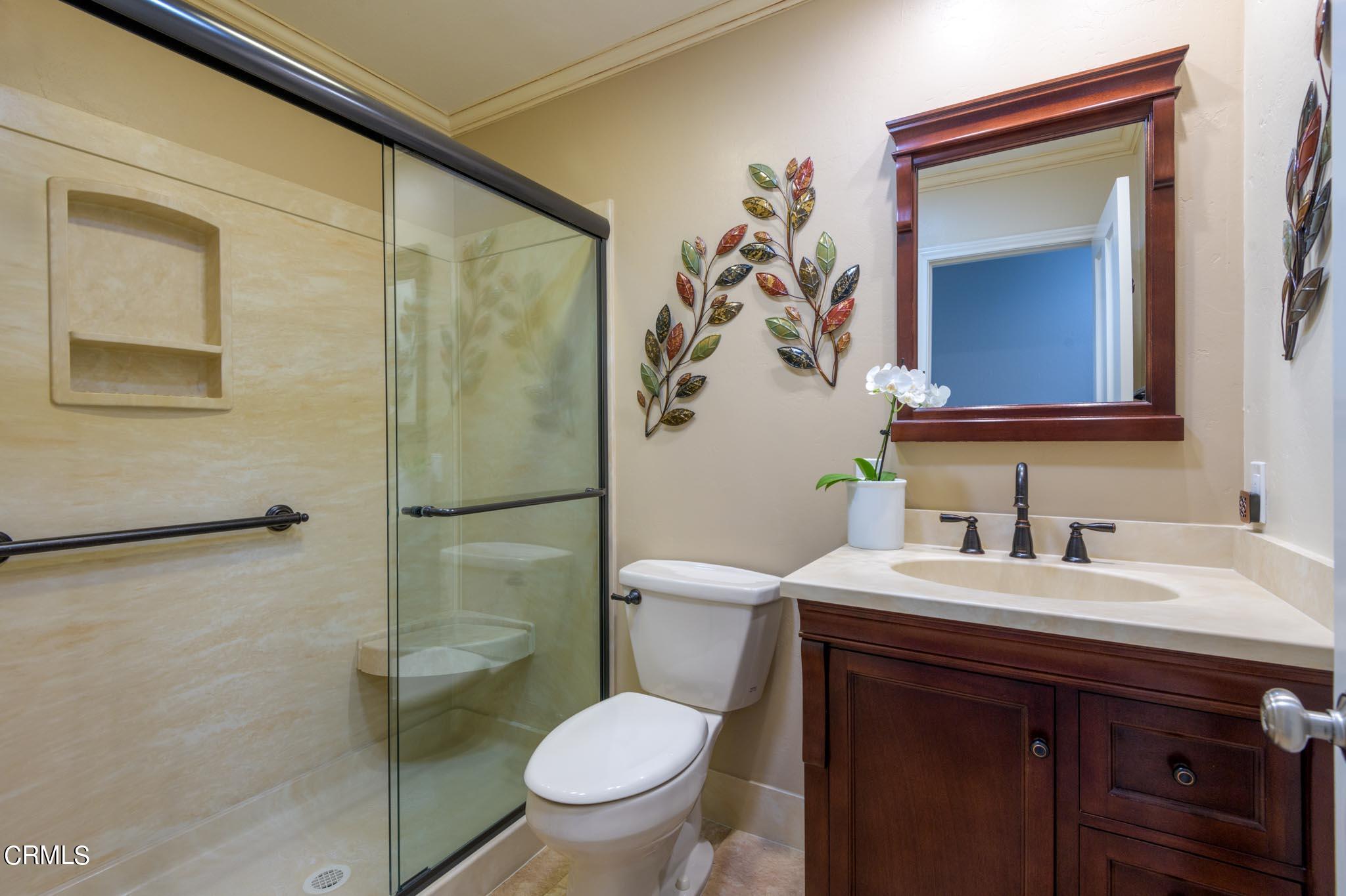 10430 Ojai Santa Paula Road Ojai, CA 93023 - Photo 14 of 25 a bathroom with a sink a toilet and shower