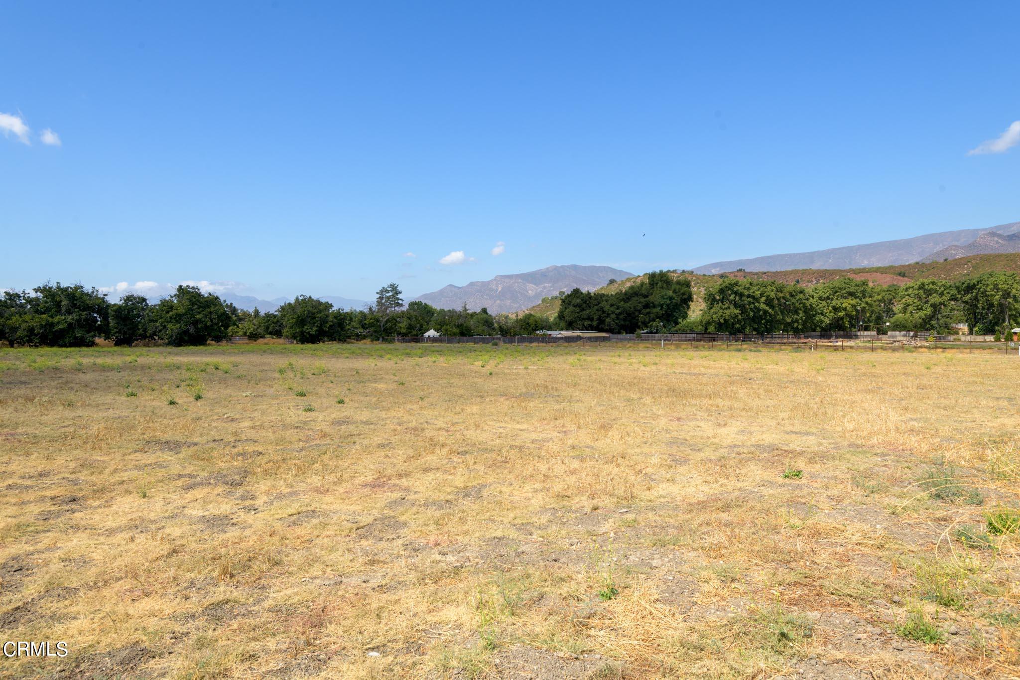 10430 Ojai Santa Paula Road Ojai, CA 93023 - Photo 19 of 25 a view of a lake with houses in the background