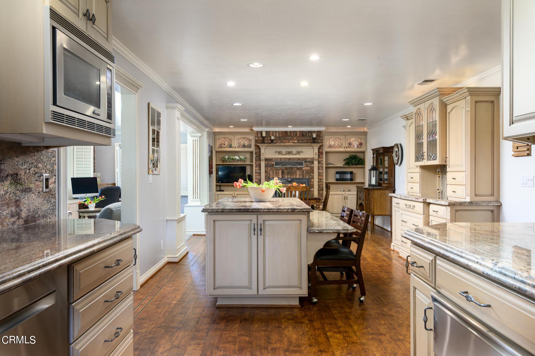10430 Ojai Santa Paula Road Ojai, CA 93023 - Photo 24 of 25 a kitchen with sink cabinets and window