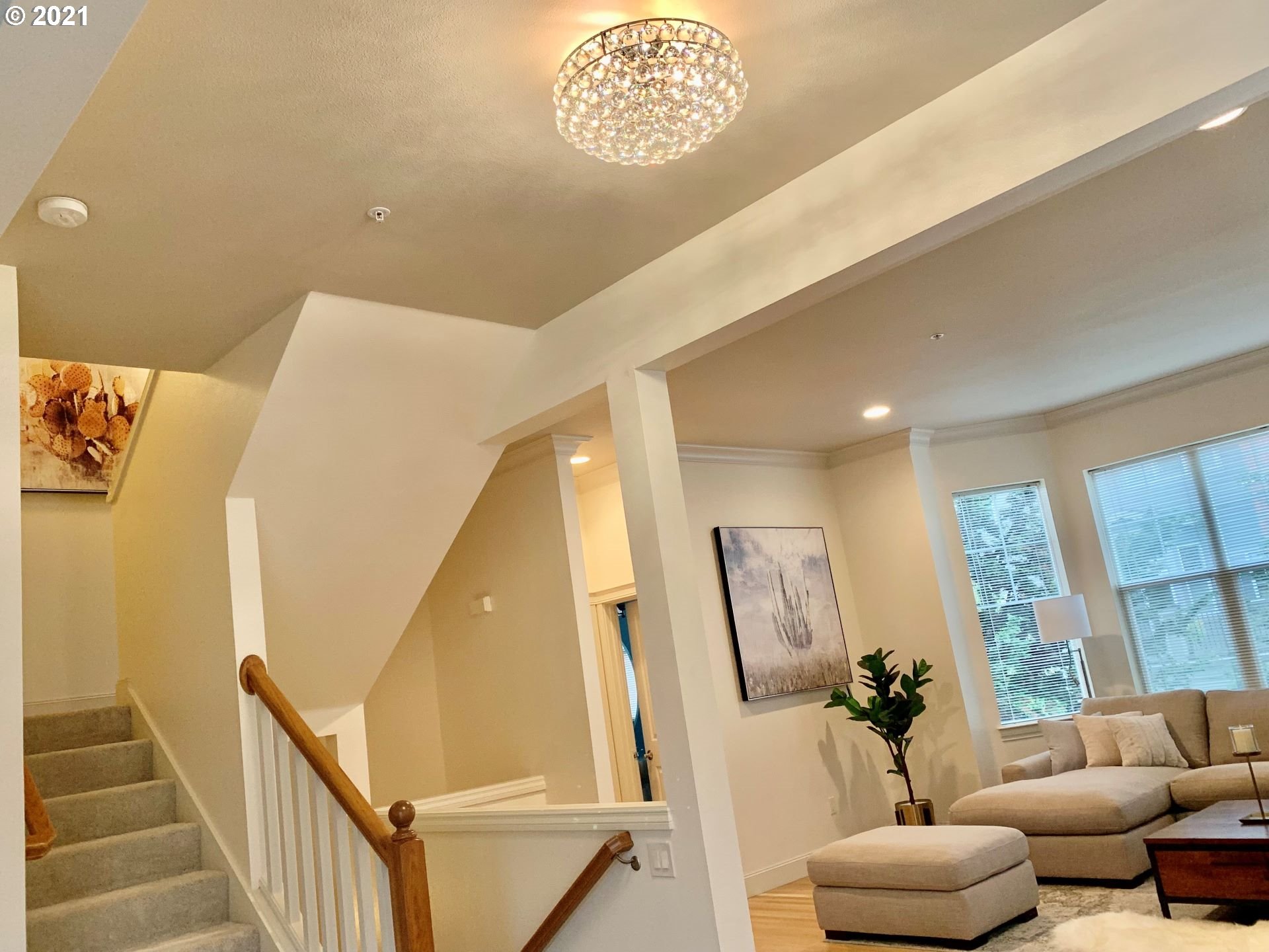 2374 Northwest Raleigh Street Portland, OR 97210 - Photo 11 of 32 a view of a livingroom with furniture and stairs