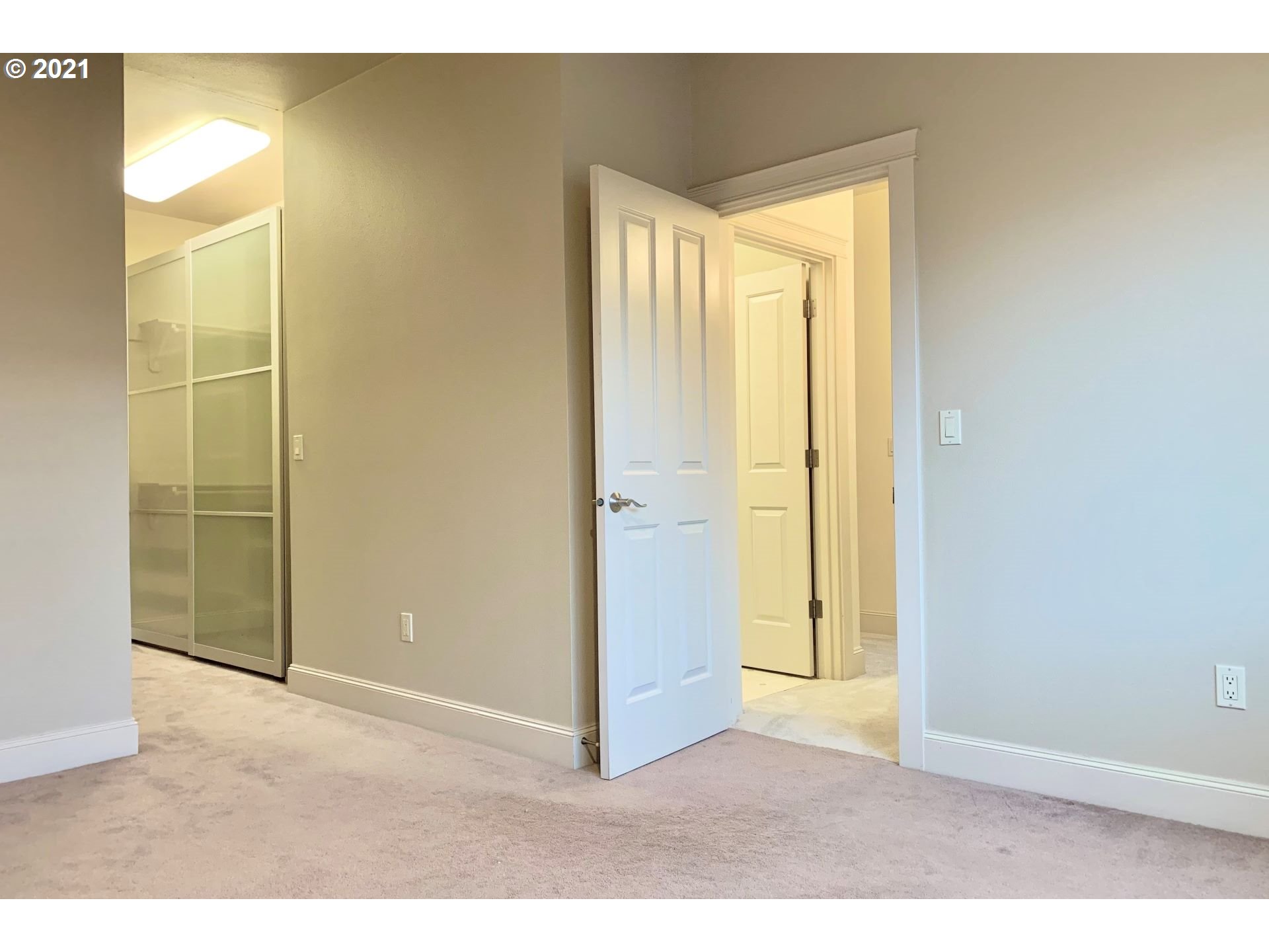 2374 Northwest Raleigh Street Portland, OR 97210 - Photo 18 of 32 a view of an empty room with window
