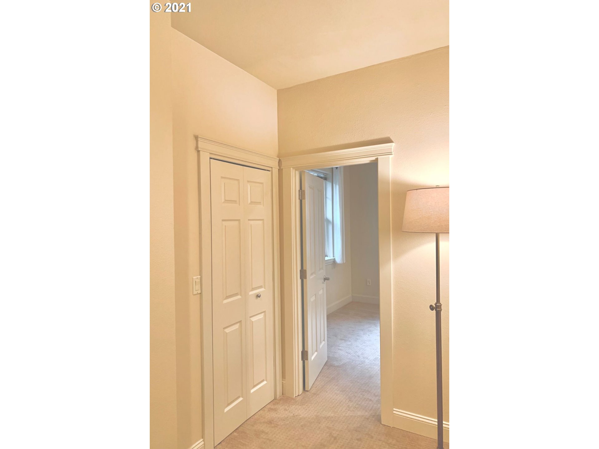 2374 Northwest Raleigh Street Portland, OR 97210 - Photo 20 of 32 a view of a bathroom from a hallway