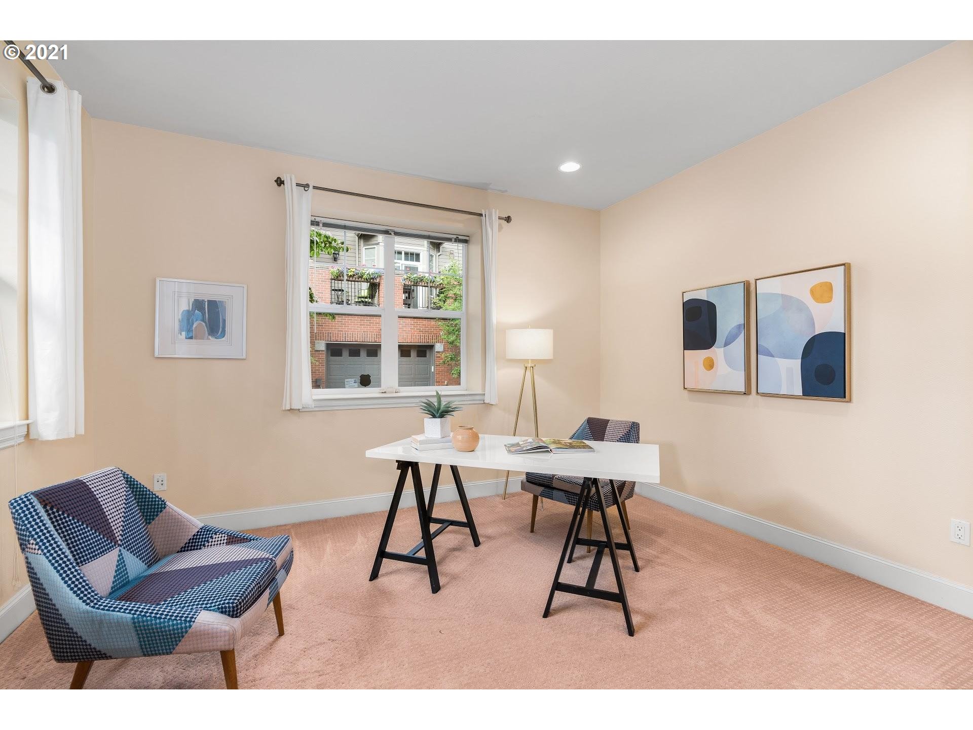 2374 Northwest Raleigh Street Portland, OR 97210 - Photo 21 of 32 a work room with furniture and a large window