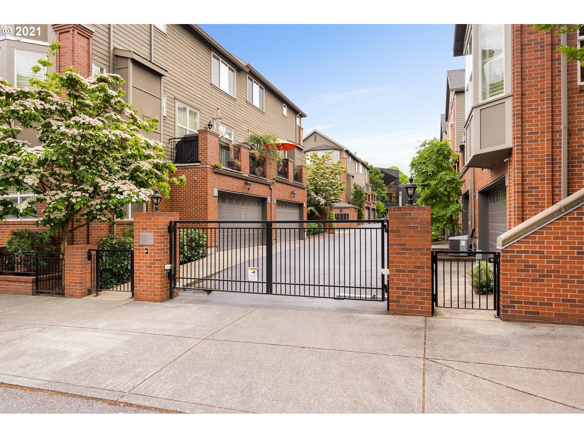 2374 Northwest Raleigh Street Portland, OR 97210 - Photo 30 of 32 a view of a building with many windows
