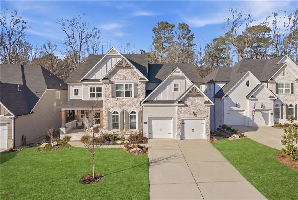 a front view of a house with a yard