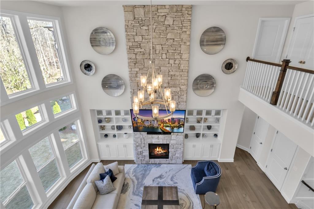 244 Wild Rose Circle Canton, GA 30115 - Photo 16 of 55 a living room with furniture and a fireplace