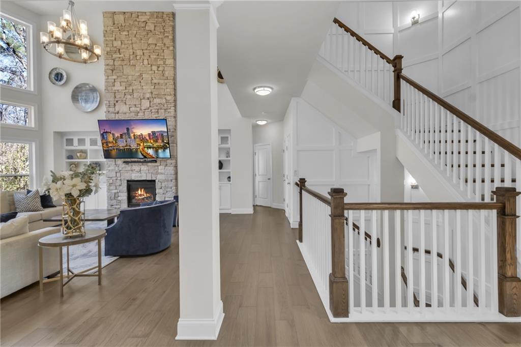 244 Wild Rose Circle Canton, GA 30115 - Photo 25 of 55 a view of a livingroom with furniture and staircase