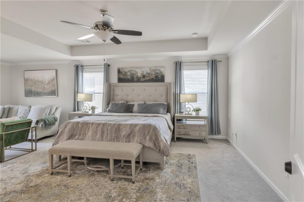 244 Wild Rose Circle Canton, GA 30115 - Photo 34 of 55 a bed room with a bed and a table